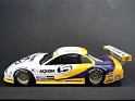 1:43 Minichamps Oldsmobile Aurora 1996 White W/Purple & Yellow Stripes. Uploaded by indexqwest